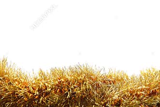 Gold tinsel on white background