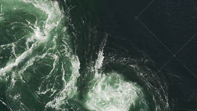 Close up of strong tidal current Saltstraumen in Norway with vortex