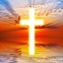 Cross on sunrise sky