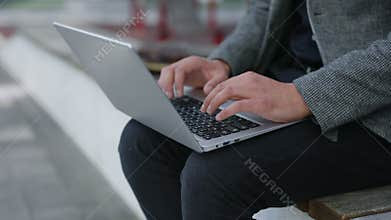 Caucasian Businessman User Hands Typing on Laptop Keyboard Sitting at the Bench, Businessman Professional Working