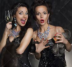 Women celebrating birthday in restaurant. Holidays