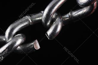 Cut chain link on black