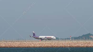 Airbus A321 of HK Express taxiing at Chek Lap Kok airport