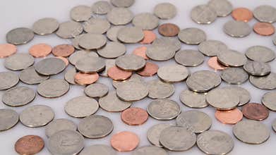 Coin rotating