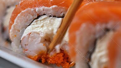A piece of sushi roll that fell apart.