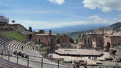 View of the Ancient Theatre of Taormina with Mount Etna in the Background - Sicily, Italy