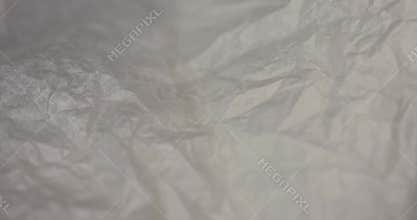 crumpled paper after prolonged use, thin paper made of cellulose as