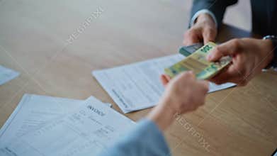 Businesspeople exchanging dollars euro in buro closeup. Banker hands giving cash