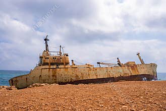 Edro III Shipwreck on Rocky Coastline of Cyprus with Blue Sea