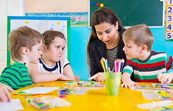 Little children at applique lesson