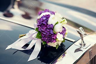 Wedding Bouquet on a wedding car
