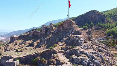 Ancient ruins in Fethiye Turkey. Drone aerial over Mediterranean landscape.