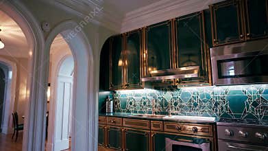AI-generated stylish kitchen with geometric backsplash seen through classic arched corridor interior