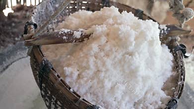salt , video of natural cooking salt in a basket, used as seasoning and food ingredient.