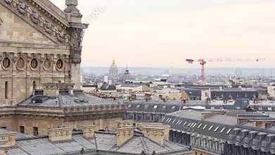 Closeup rooftop view of Palais Garnier and Paris skyline