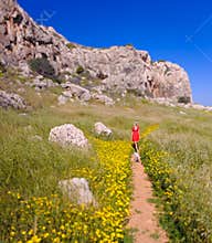 A girl with her dog on a summer path,cyprus 2