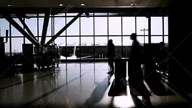 Travellers in airport terminal