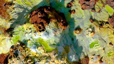 Aerial view of vibrant sulfur flats and mineral formations in Danakil Depression, Ethiopia