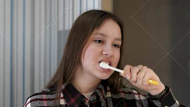 Smile Bright A Woman Brushing Her Teeth with Confidence and Joy Every Single Day