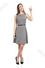 Full body of a standing woman pointing at side
