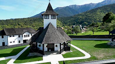Drone shot of Bran Monastery (Manastirea Bran) on a sunny day in Strada Balaban, Simon, Romania