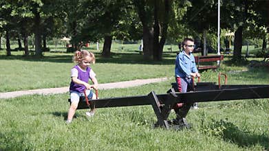 Children fun on seesaw