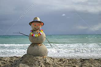 Snowman on beach