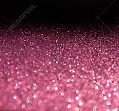 Pink abstract glitter bokeh lights background. defocused lights