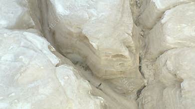 AKTAU, KAZAKHSTAN - FEBRUARY 1, 2025: Explore the unique erosion patterns and formations in the white cliffs of Akatau