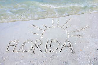 Florida & sun drawn in sand tropical beach vacation