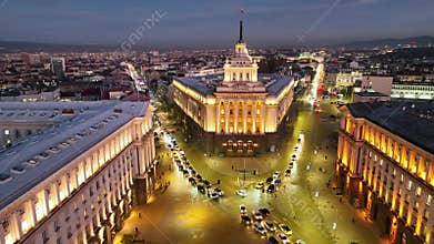 Aerial night view of capital of Bulgaria Sofia. Three architectural and iconic buildings of the communist era.