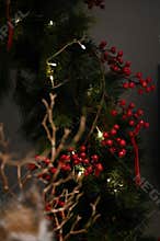 Chrismast decoration details with green leafy plants and twigs
