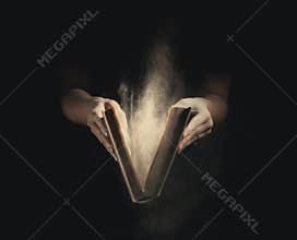 Opening an old book.