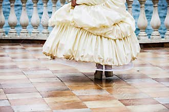 Wedding dance. Beautiful woman in white gown of the bride dance
