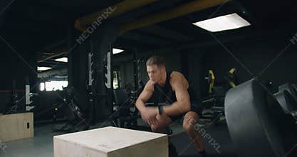 Athlete Performing Box Jumps at a Modern Fitness Gym