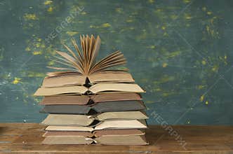 Stack of open books