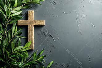 Faith and hope are embodied by the wooden cross paired with an olive branch