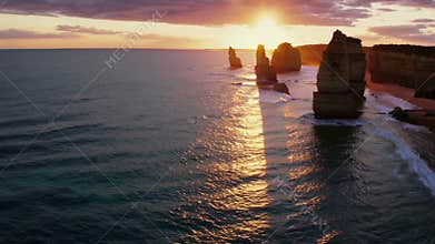 Twelve apostles shining during golden sunset over great ocean road
