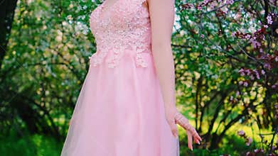 Cute happy adult girl smiling face eyes lips walking in spring blooming garden health concept freedom from allergies