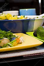 Cooked food on yellow platter