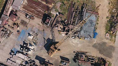 Industrial zone with scrap metal for recycling.