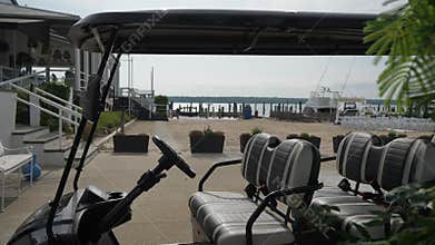 Experience a Modern Electric Golf Cart for a unique adventure at a beautiful waterfront location