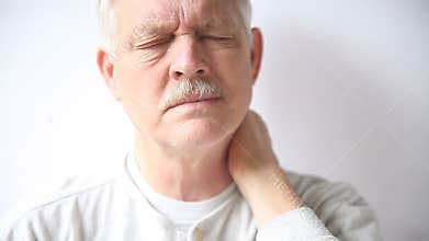 Senior man with stiff neck