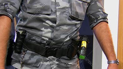 Armed officer with two guns