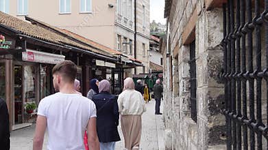 People walking in the city center of Sarajevo, Bosnia and Herzegovina, during daytime