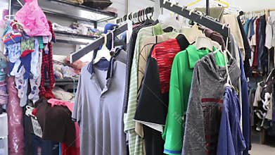 Thrift shop with different types of clothing and accessories