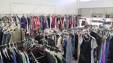 Thrift shop with different types of clothing and accessories
