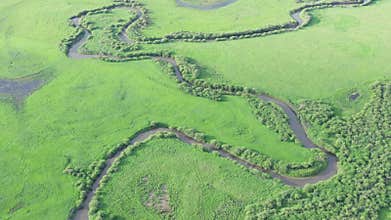 Aerial footage of the Nine Bends of Ulagai Prairie (Wulagai Grassland), in Inner Mongolia, China