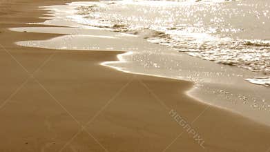 Waves breaking on the beach