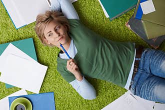 Woman thinking on floor